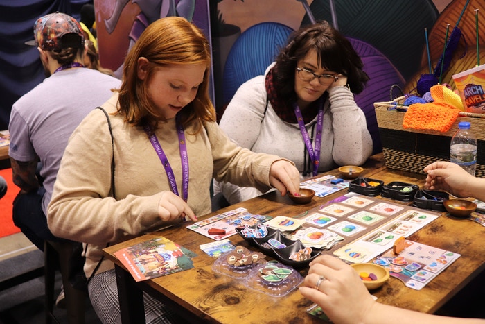 Young girl playing ArchRavels at C2E2 who happens to look exactly like one of our characters, Eliza. 
