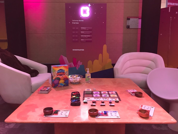 Pink, Space themed kickstarter room at PAX Unplugged to demo ArchRavels. 
