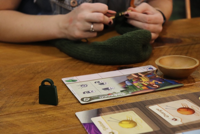 Thrifter's custom action selector is painted green and shaped like a tote bag. 